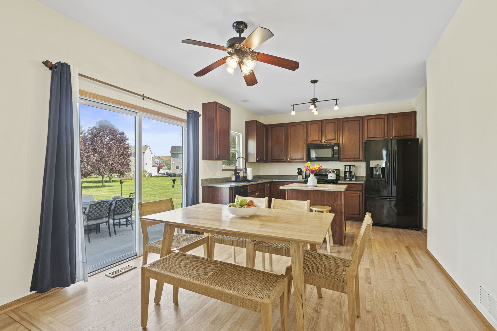 223 Aspen Circle Gilberts, IL 60136 - Photo 7 of 18 a view of a dining room with furniture window and outside view