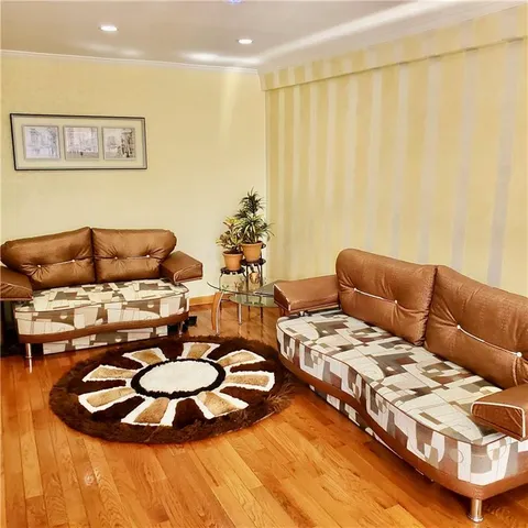 a living room with furniture and a couch