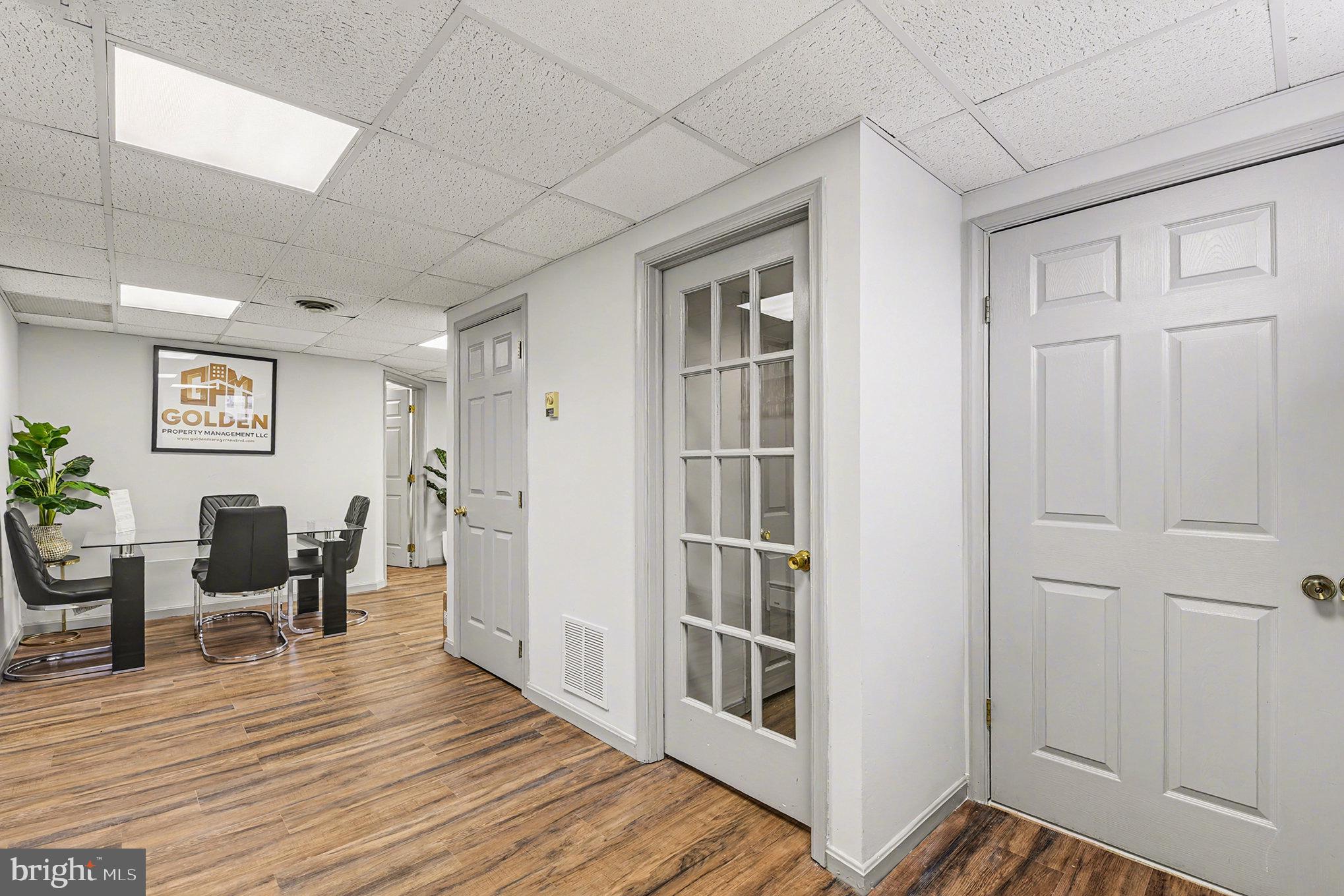 1424 East Joppa Road Baltimore, MD 21286 - Photo 13 of 30 a view of a livingroom with wooden floor and furniture