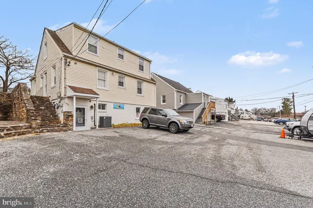 a view of a city street with a building