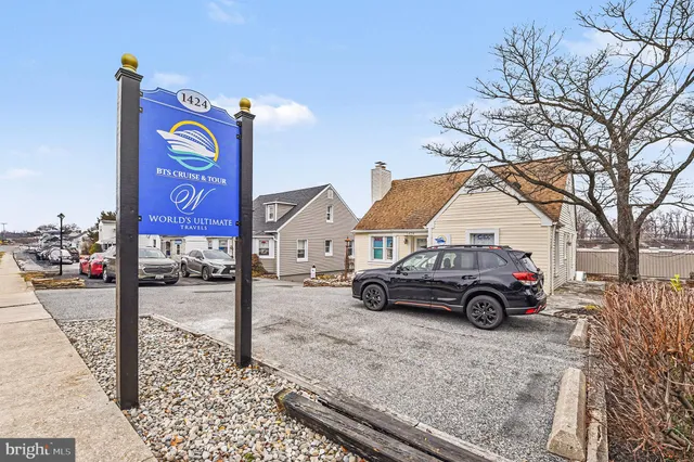 a car parked in front of a house