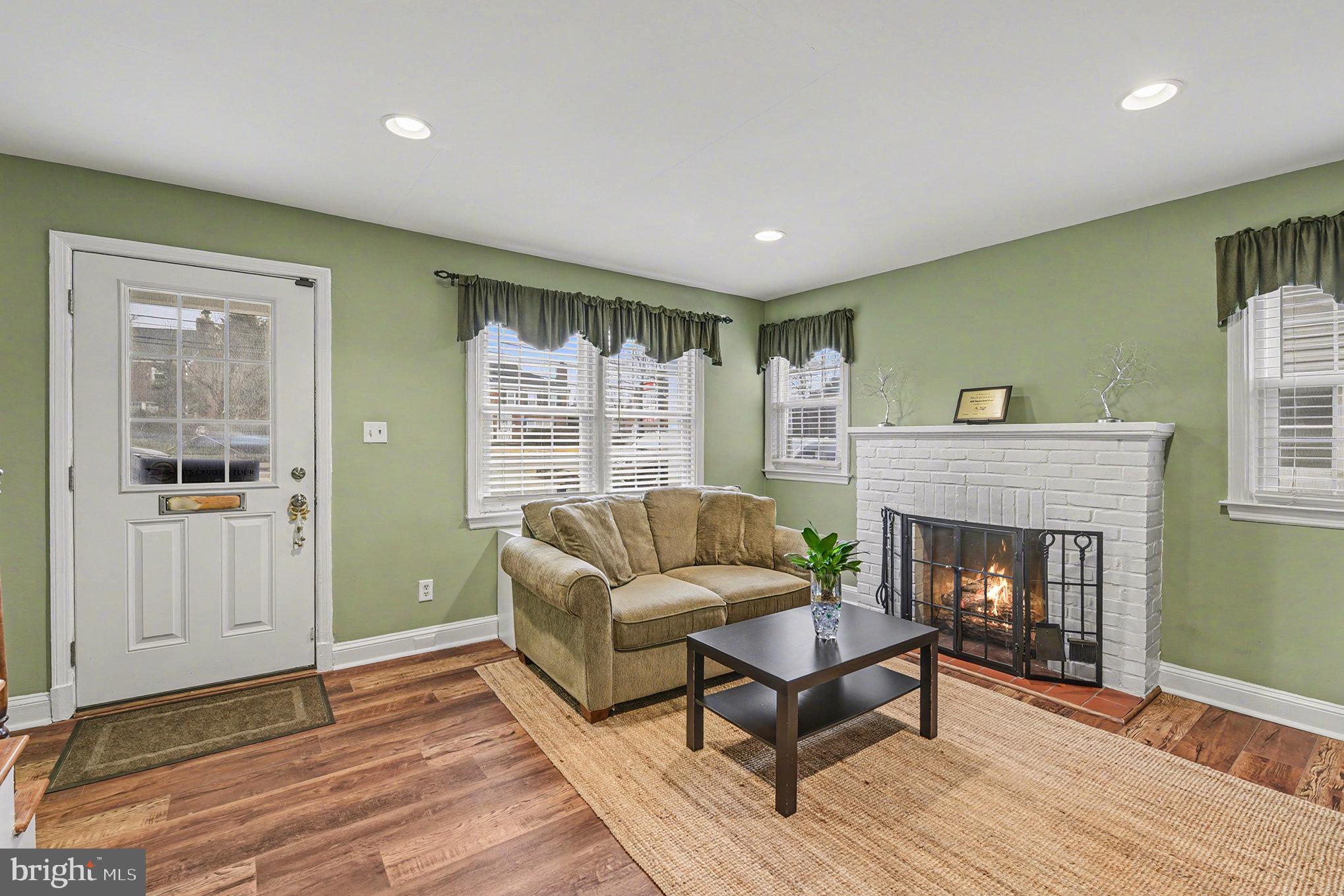 1424 East Joppa Road Baltimore, MD 21286 - Photo 5 of 30 a living room with furniture and a fireplace