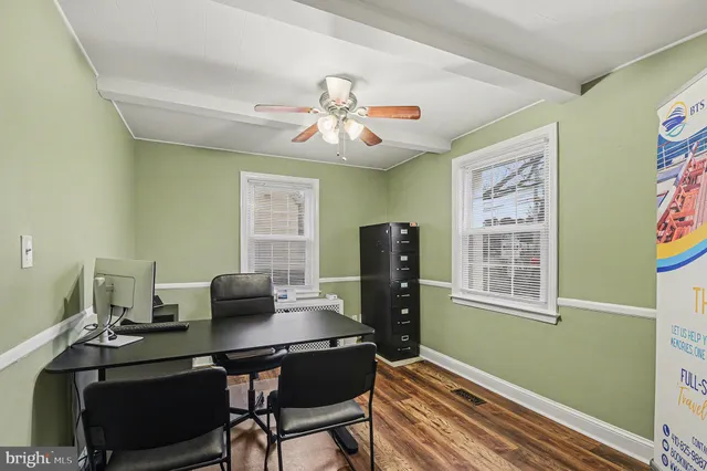 a workspace with furniture and window