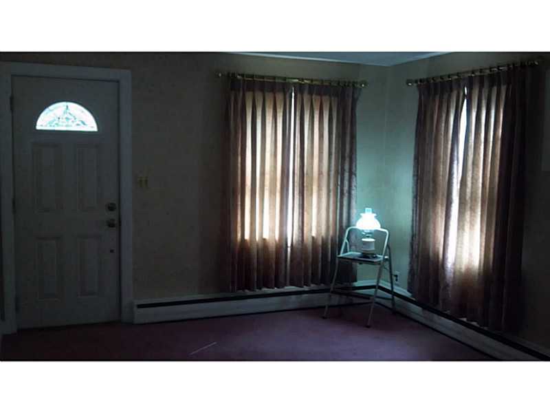 19 Howland Road Cranston, RI 02910 - Photo 4 of 8 Living Room.