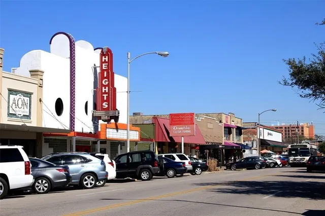 a view of a car parked in front of a building