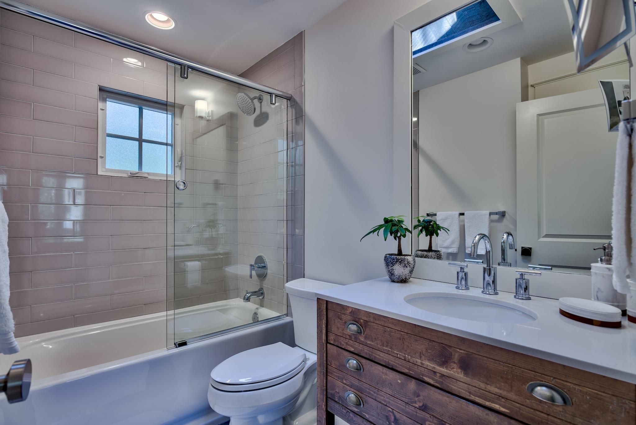 102 Camp Creek Road South Inlet Beach, FL 32461 - Photo 24 of 58 a bathroom with a granite countertop sink a toilet and shower