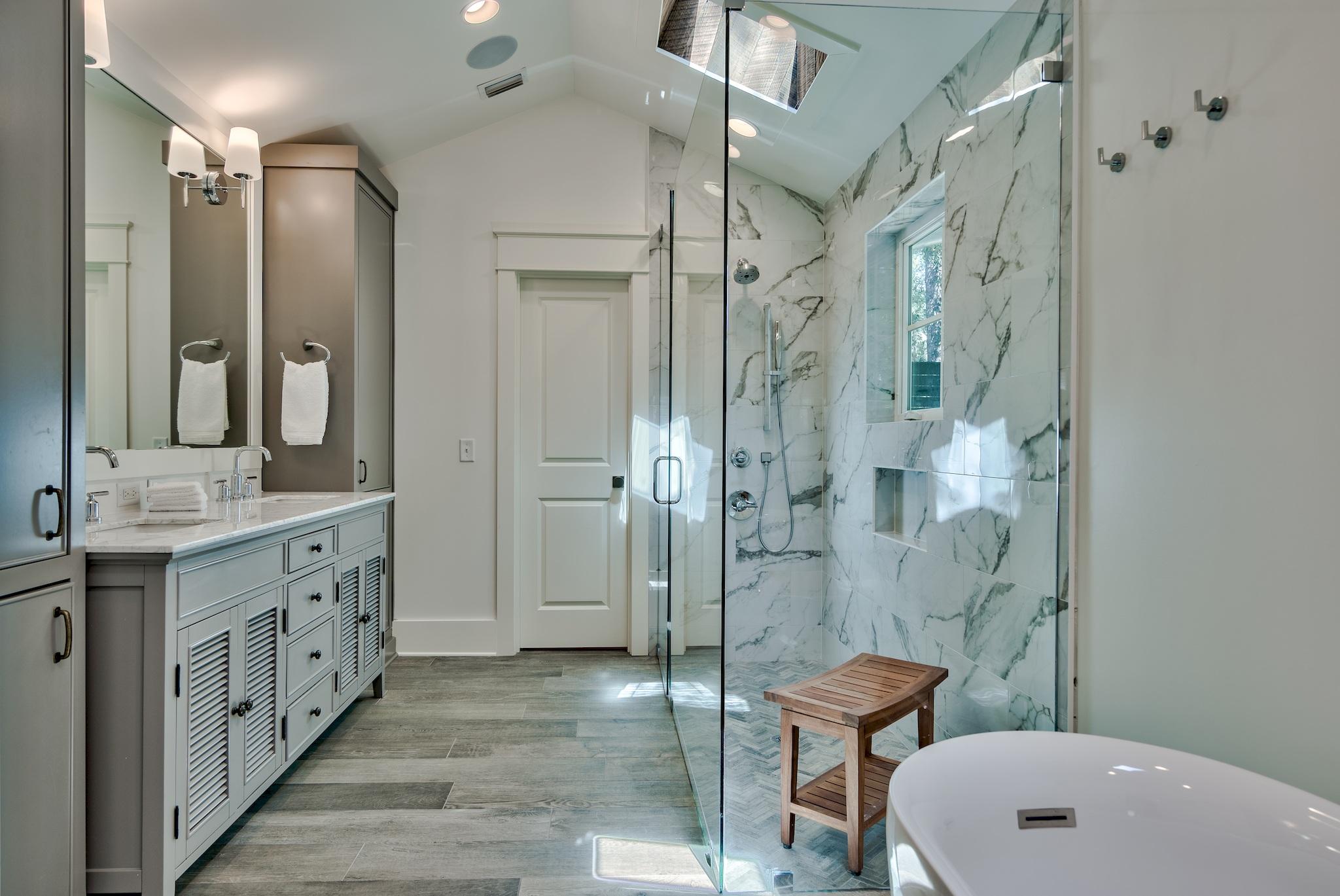 102 Camp Creek Road South Inlet Beach, FL 32461 - Photo 32 of 58 a bathroom with a double vanity sink toilet mirror and shower