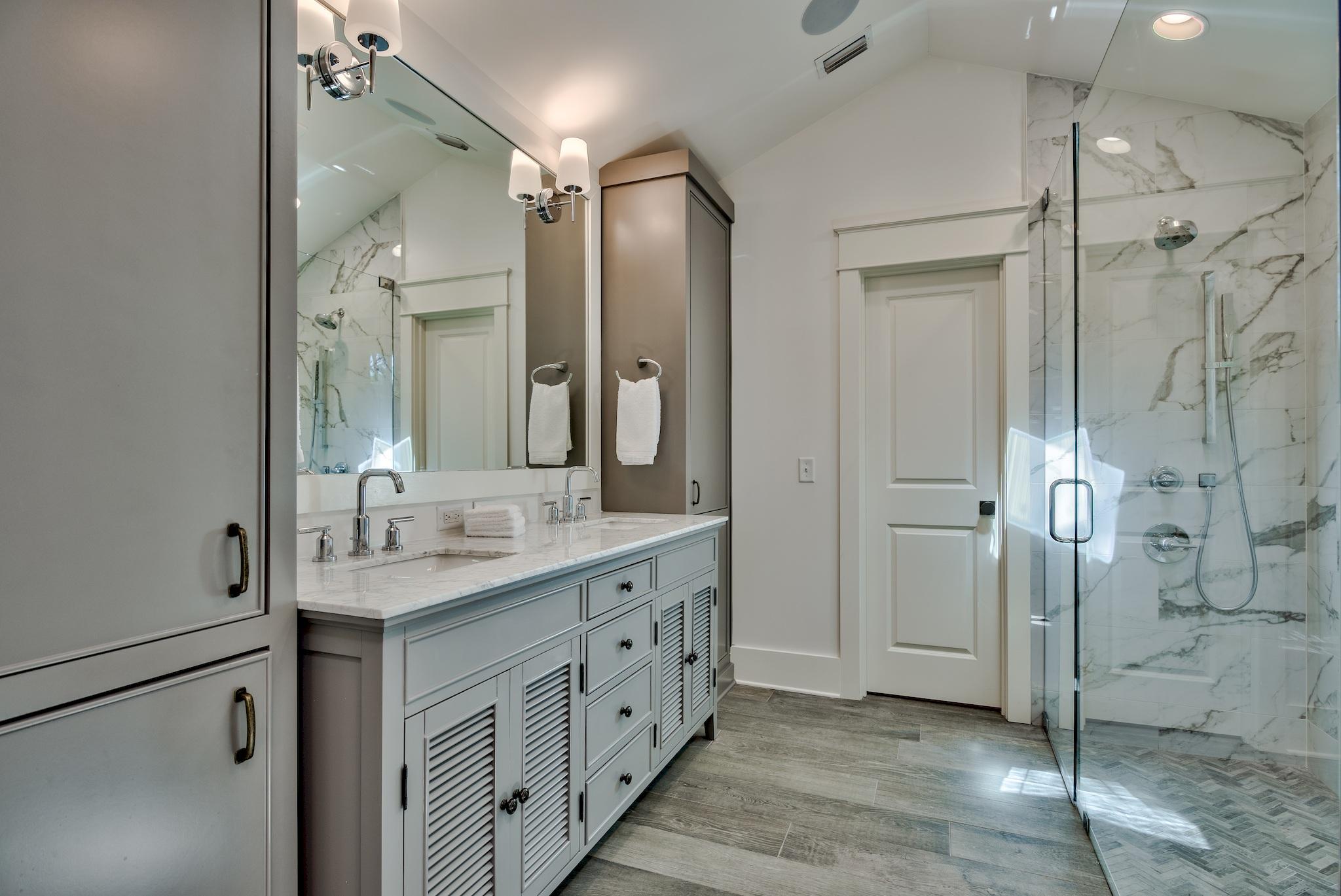 102 Camp Creek Road South Inlet Beach, FL 32461 - Photo 33 of 58 a bathroom with a double vanity sink mirror and shower