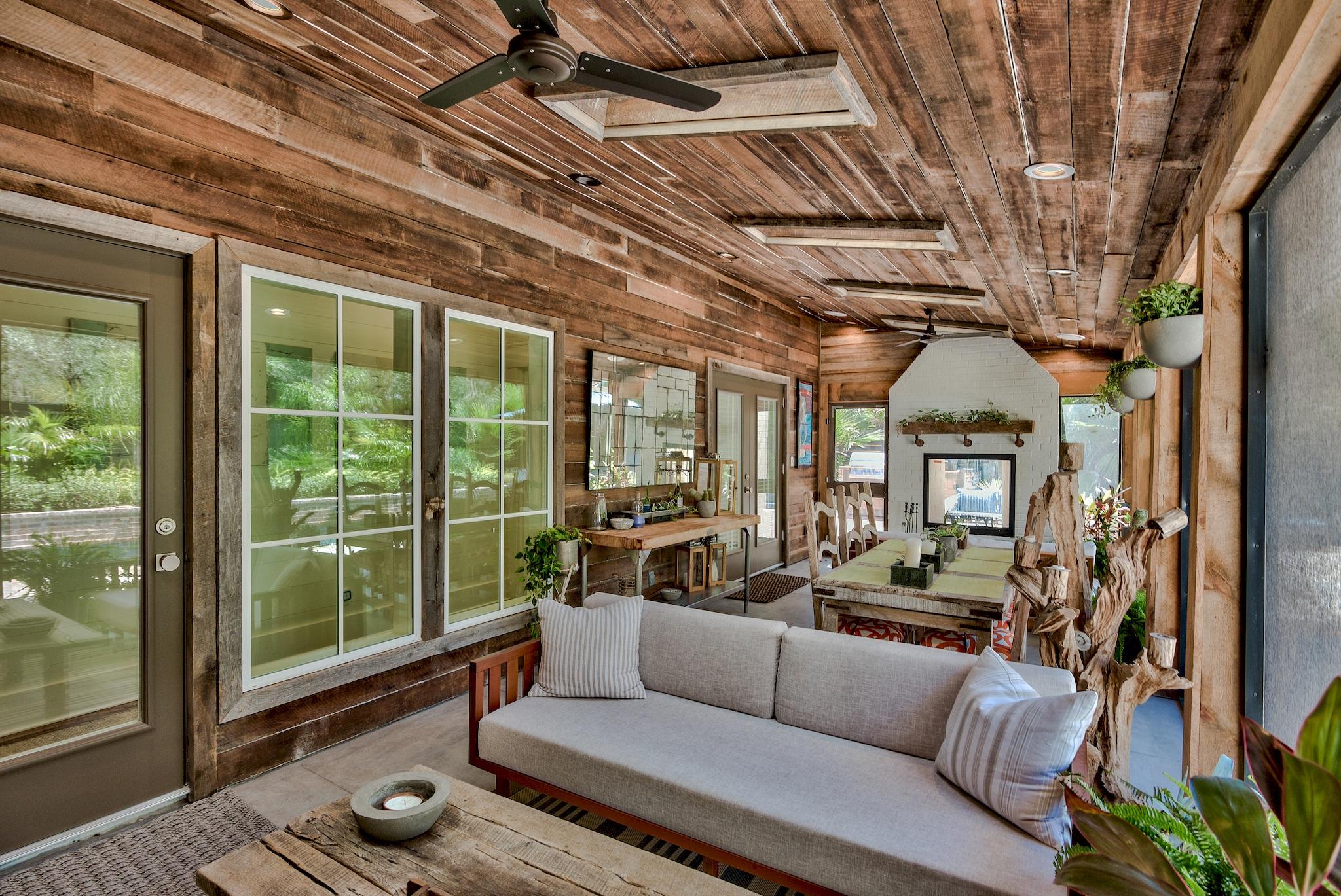 102 Camp Creek Road South Inlet Beach, FL 32461 - Photo 36 of 58 a living room with furniture and a floor to ceiling window