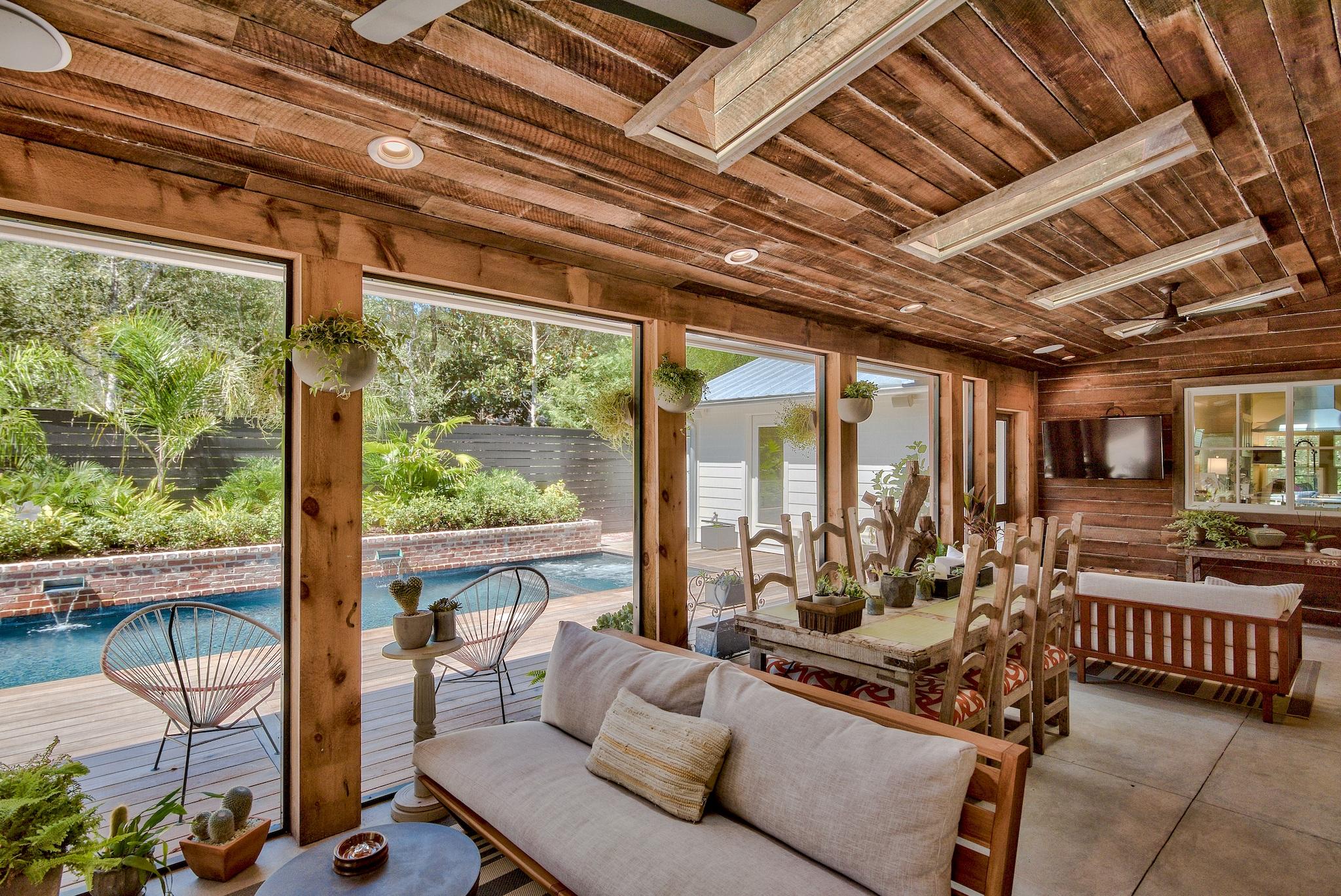 102 Camp Creek Road South Inlet Beach, FL 32461 - Photo 38 of 58 a living room with furniture and a floor to ceiling window