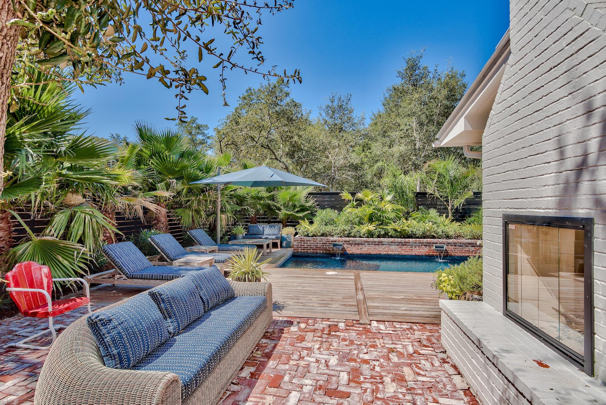 102 Camp Creek Road South Inlet Beach, FL 32461 - Photo 40 of 58 a view of a backyard with furniture and a garden