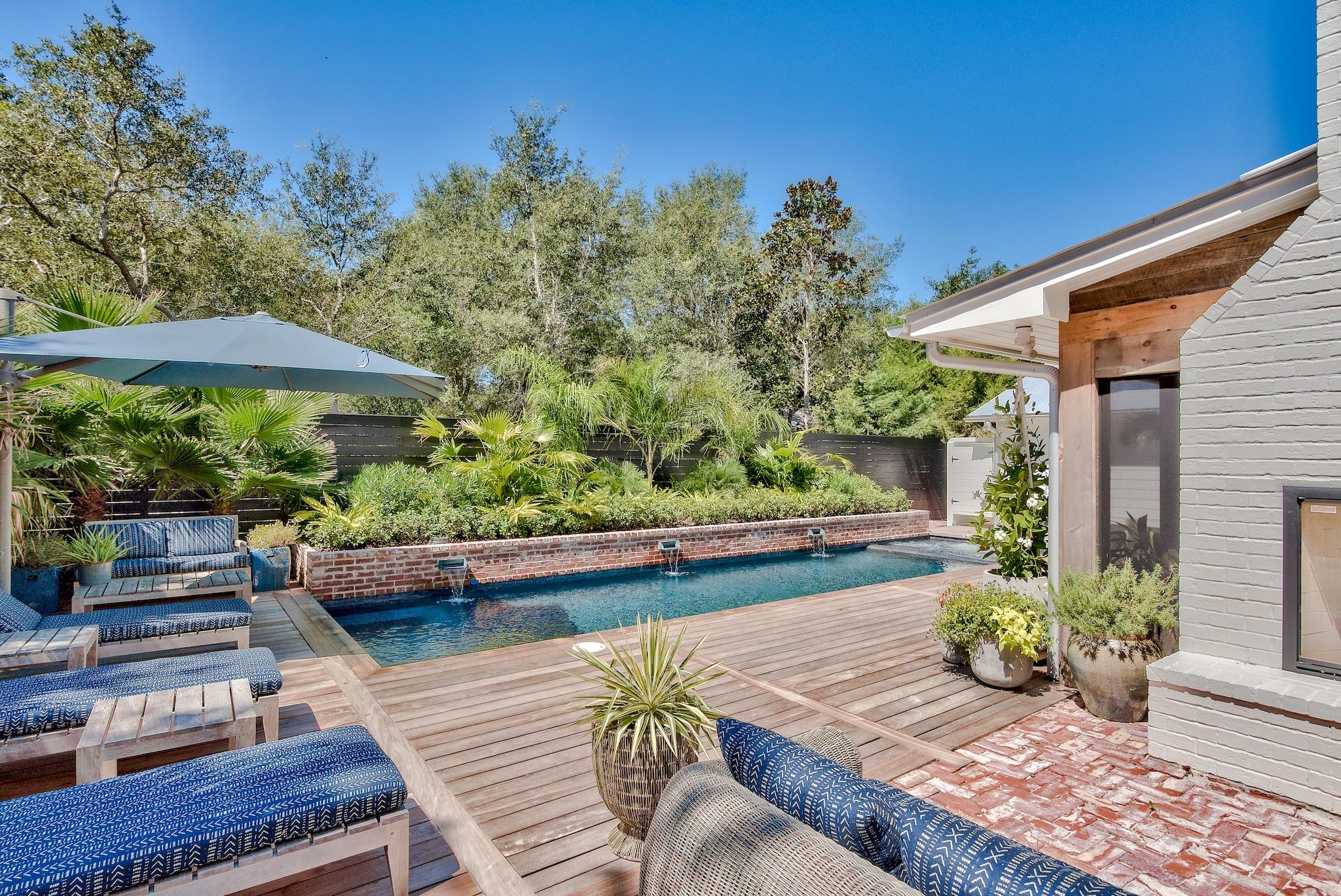 102 Camp Creek Road South Inlet Beach, FL 32461 - Photo 44 of 58 a view of a backyard with sitting area