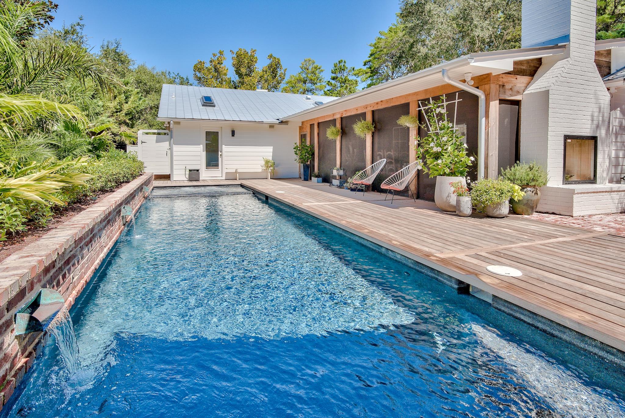 102 Camp Creek Road South Inlet Beach, FL 32461 - Photo 47 of 58 a view of a house with backyard and sitting area