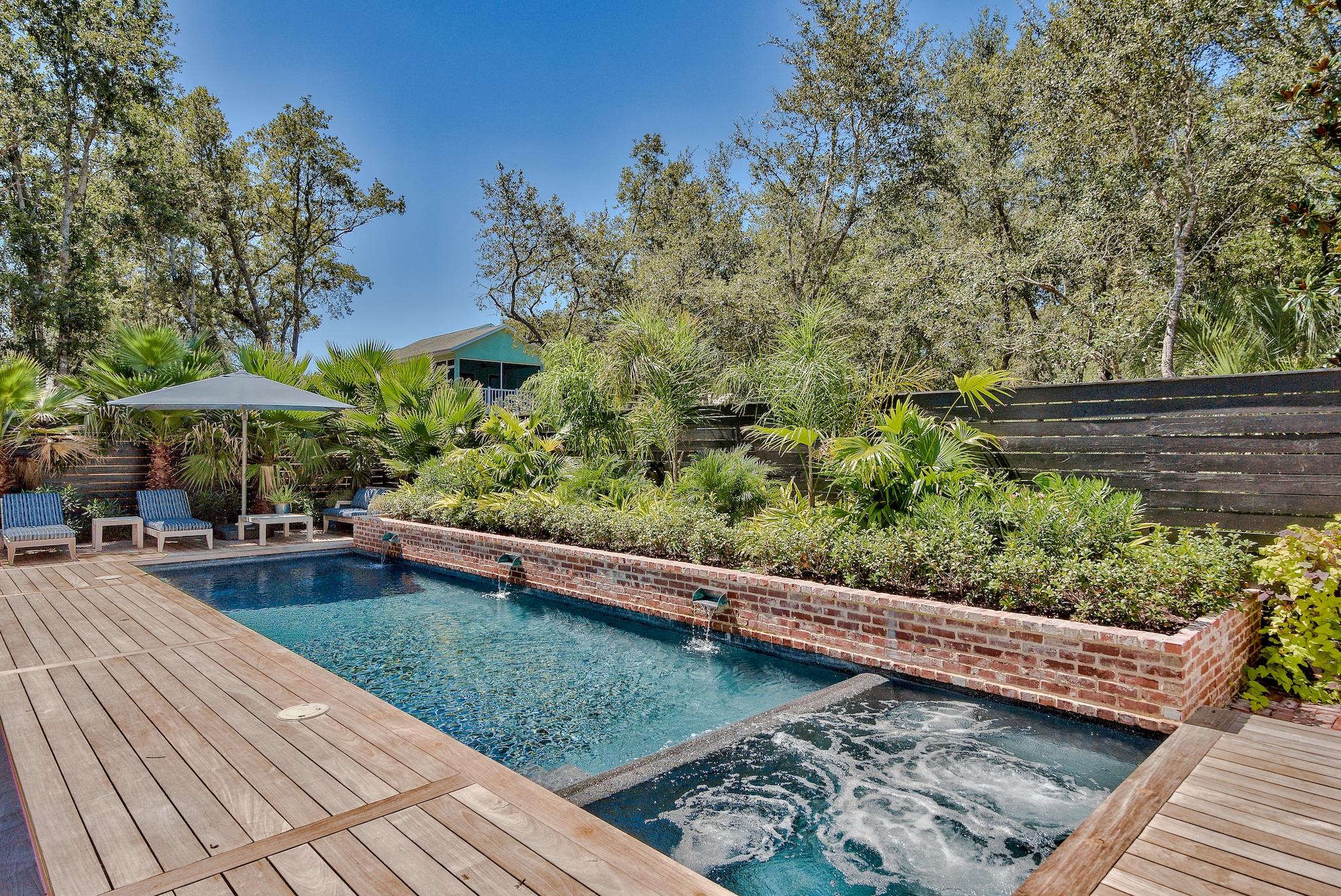 102 Camp Creek Road South Inlet Beach, FL 32461 - Photo 51 of 58 a view of a swimming pool with a patio