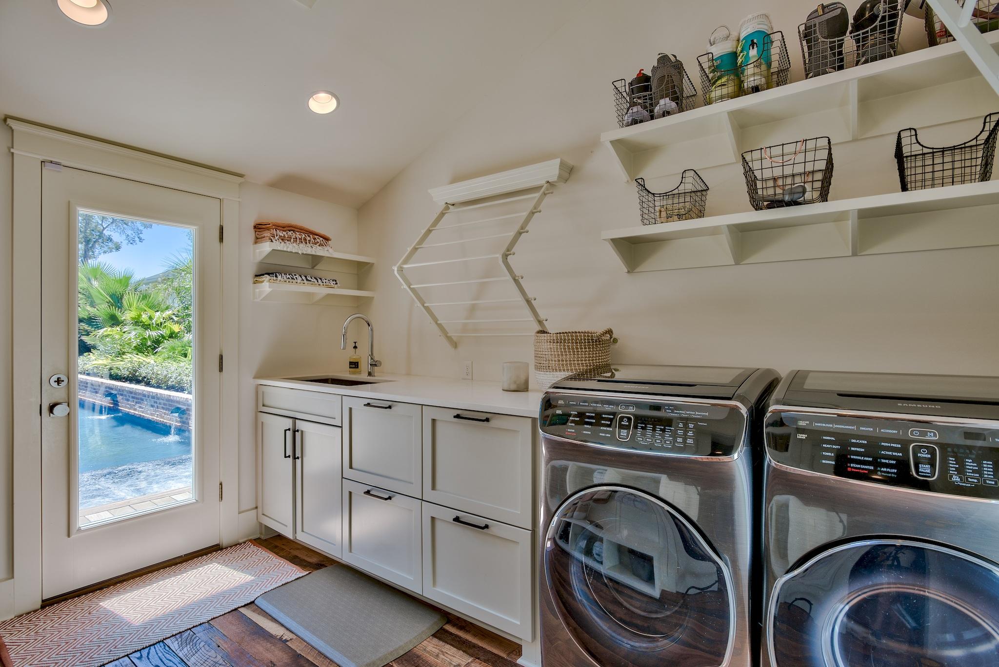 102 Camp Creek Road South Inlet Beach, FL 32461 - Photo 52 of 58 a utility room with sink dryer and washer