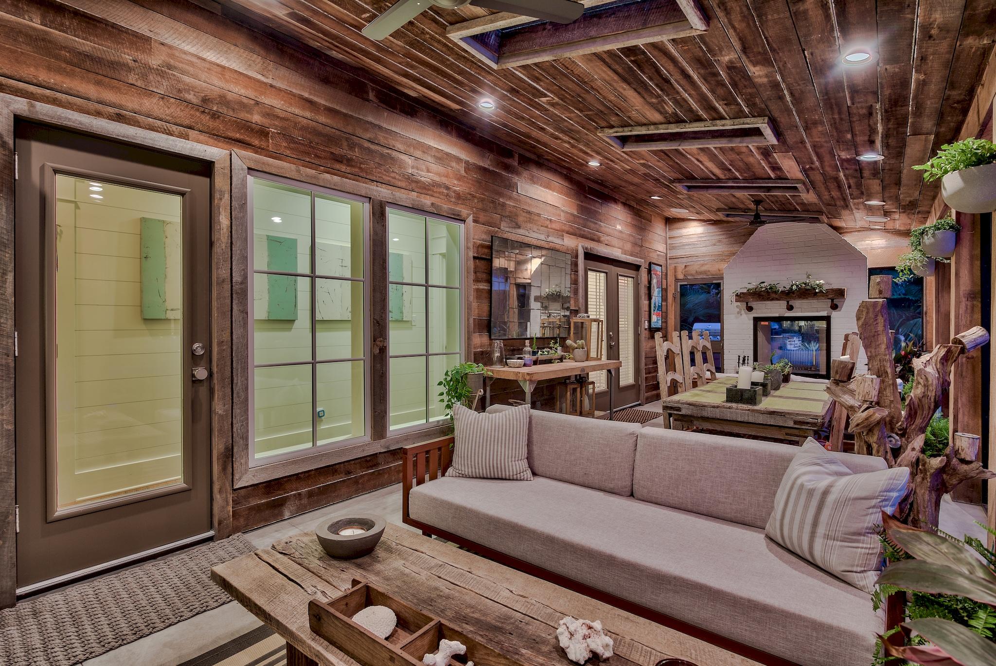 102 Camp Creek Road South Inlet Beach, FL 32461 - Photo 56 of 58 a living room with furniture and a floor to ceiling window