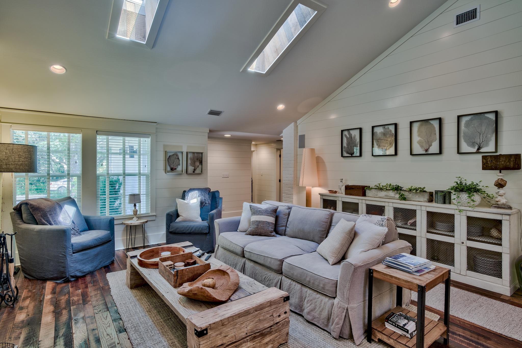 102 Camp Creek Road South Inlet Beach, FL 32461 - Photo 7 of 58 a living room with furniture and a floor to ceiling window