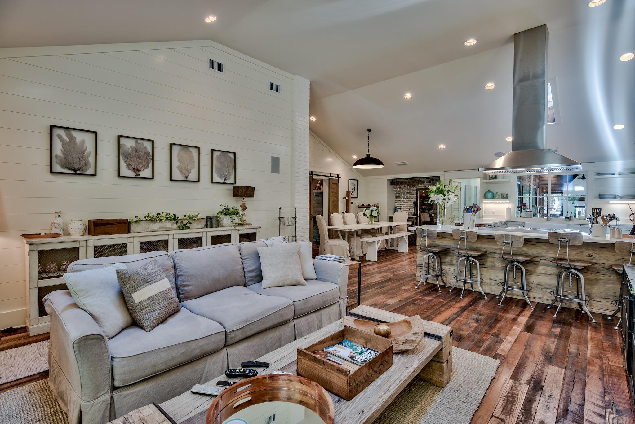 102 Camp Creek Road South Inlet Beach, FL 32461 - Photo 9 of 58 a living room with furniture kitchen view and a wooden floor