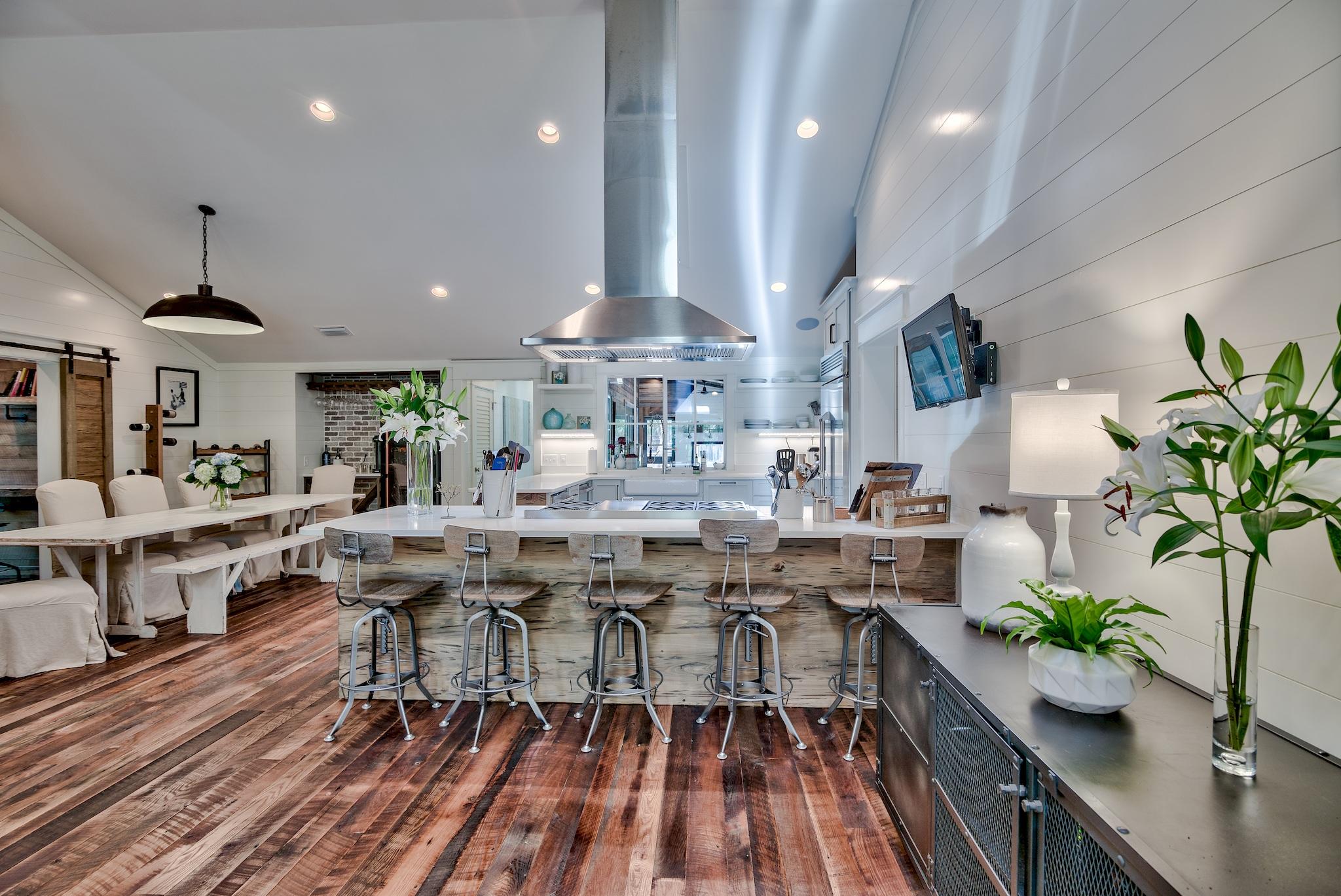 102 Camp Creek Road South Inlet Beach, FL 32461 - Photo 10 of 58 a view of a dining room with furniture window and wooden floor