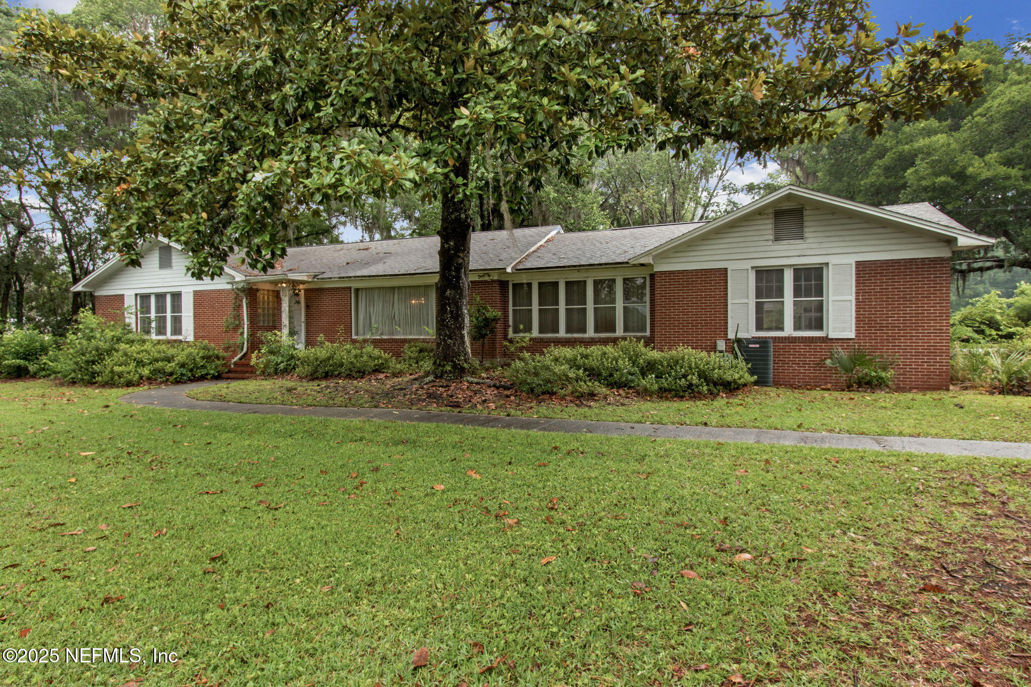 45071 Hodges Road Callahan, FL 32011 - Photo 1 of 18 a front view of house with yard and green space