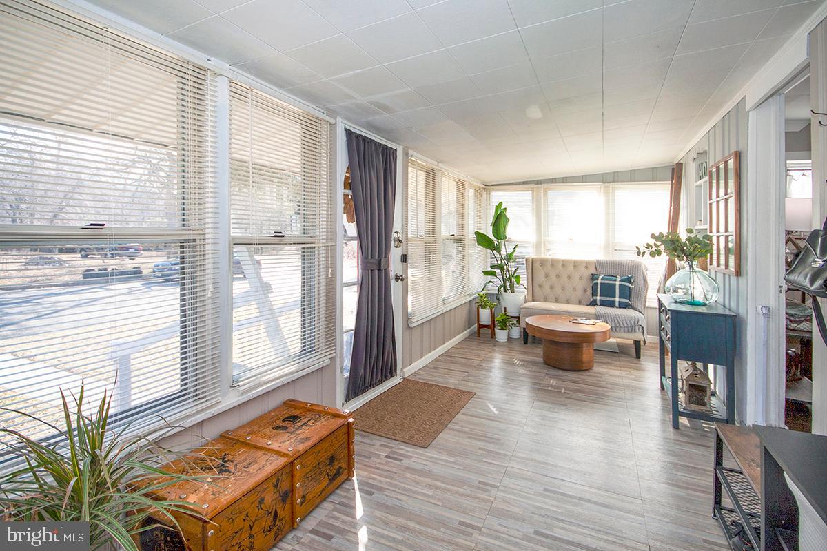 43 Rancocas Avenue Clementon, NJ 08021 - Photo 7 of 31 Front Sunporch w/ Sitting Area