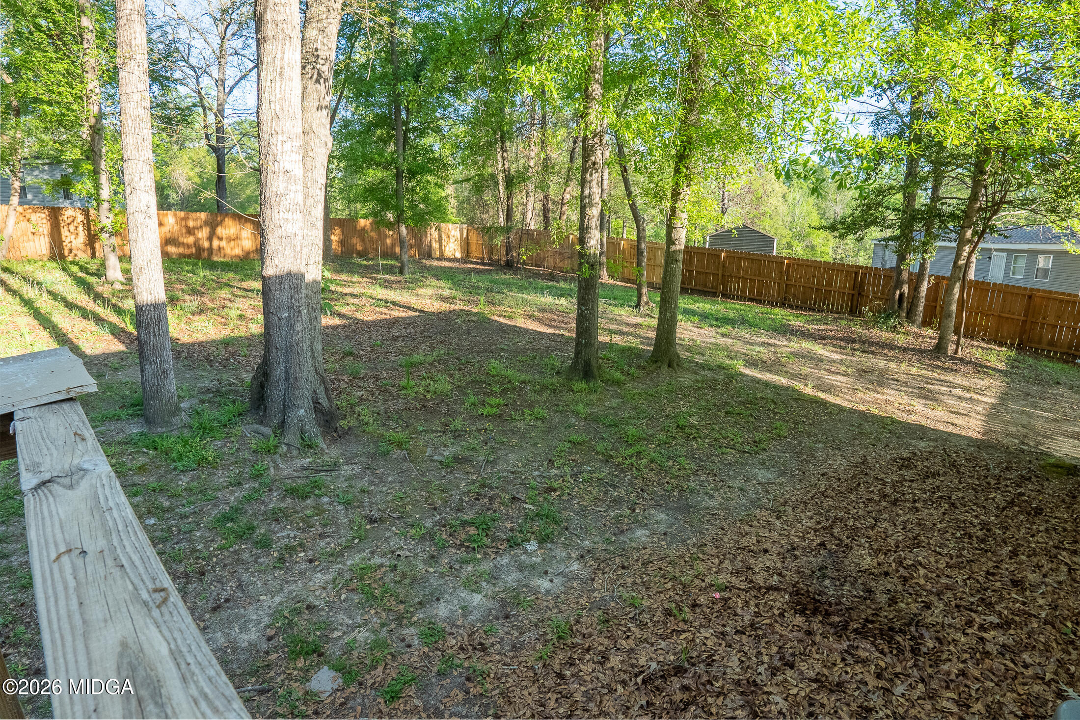 156 Alpine Drive Macon, GA 31206 - Photo 17 of 18 a view of a yard with a tree