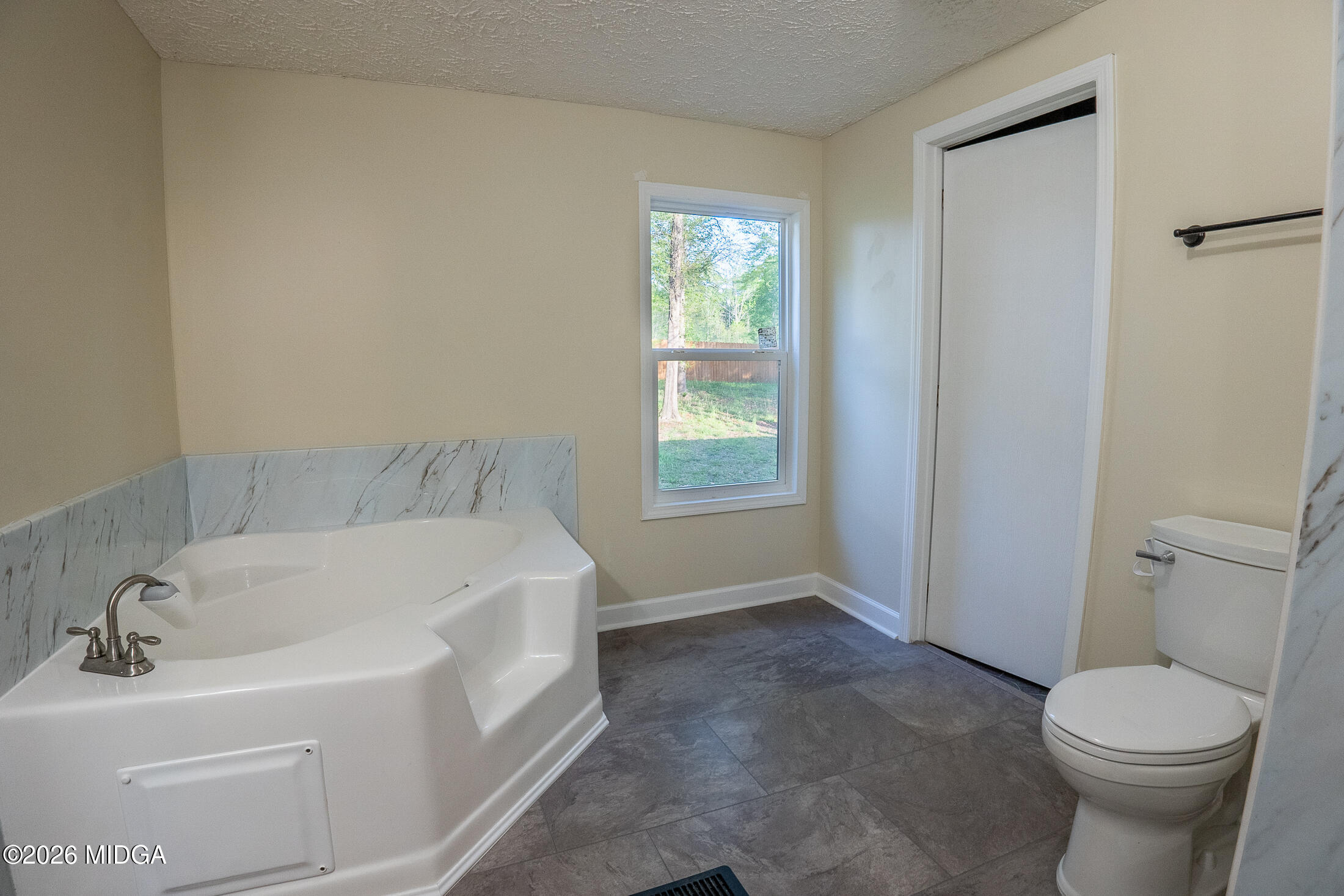 156 Alpine Drive Macon, GA 31206 - Photo 10 of 18 a bathroom with a sink and a toilet