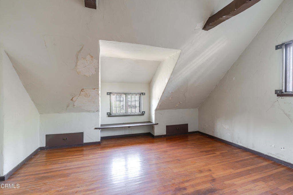 180 West State Street Pasadena, CA 91105 - Photo 38 of 52 a view of empty room with wooden floor and fan