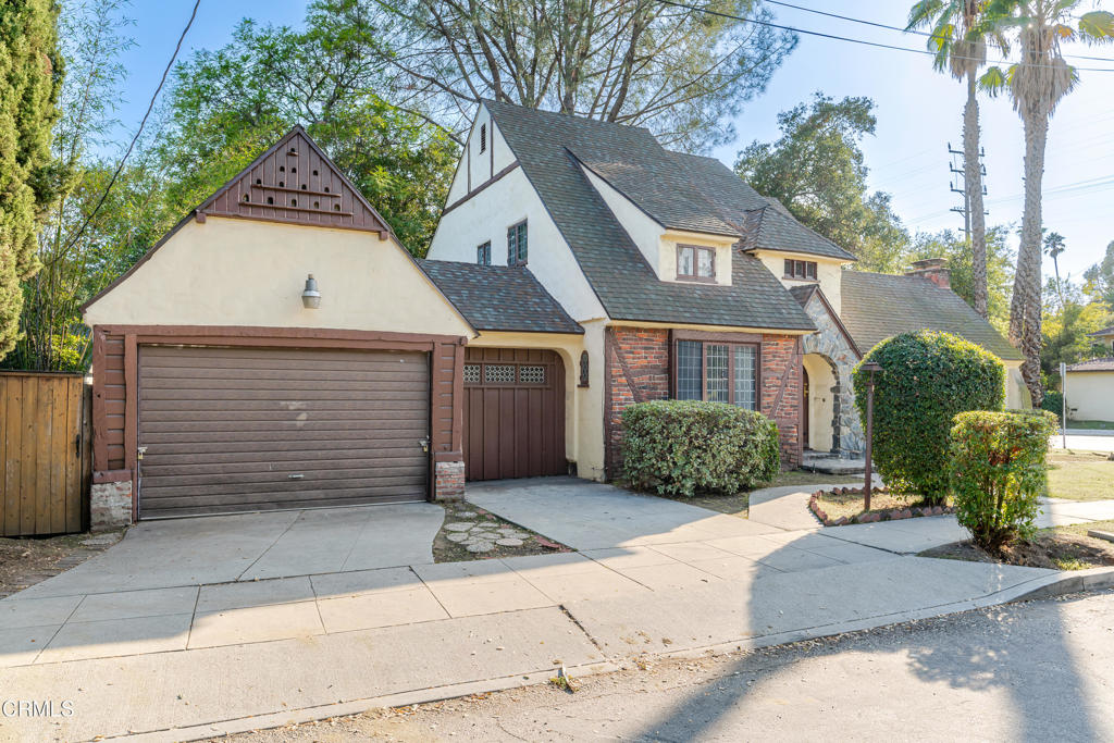 180 West State Street Pasadena, CA 91105 - Photo 47 of 52 a view of a grey house with a yard