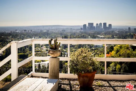 an aerial view of residential house with parking space