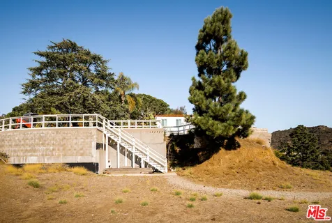a view of a balcony with lake view