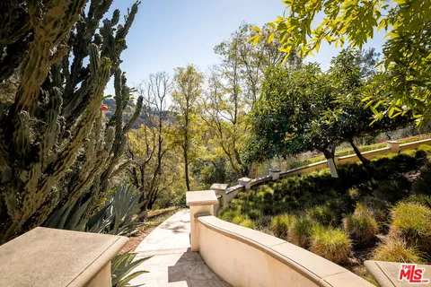 an aerial view of a highlighted house