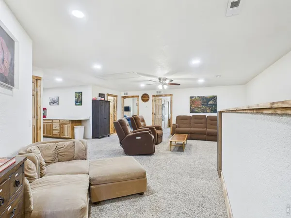 a living room with furniture and a couch