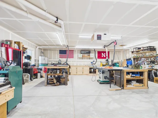 a view of a swimming pool with chairs