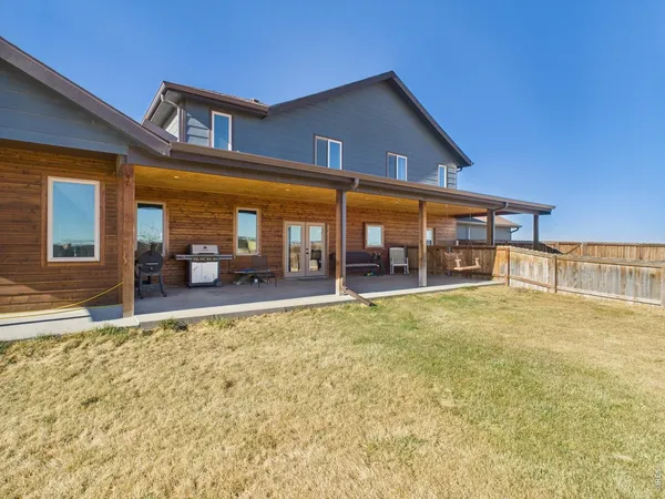 a house with trees in the background