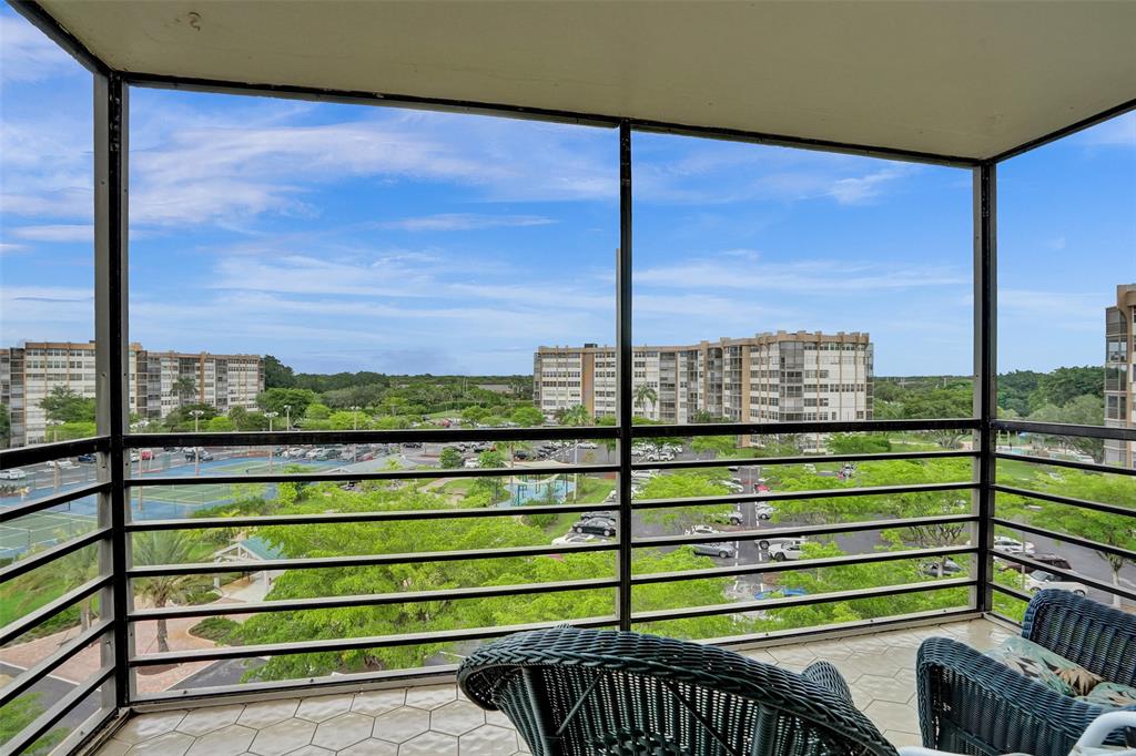 1100 St Charles Place, Unit 612 Pembroke Pines, FL 33026 - Photo 20 of 71 a view of a street from a balcony