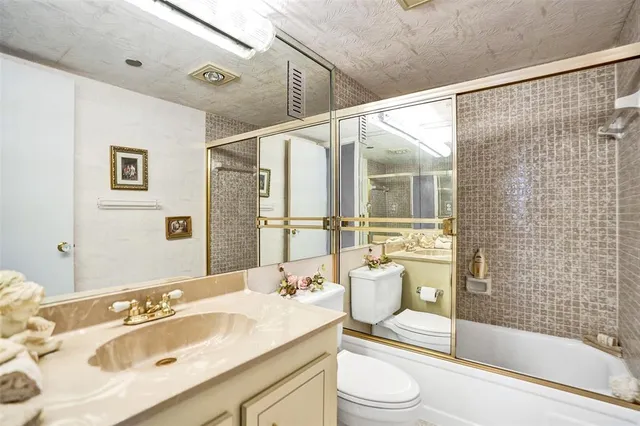 a large bathroom with a sink and a mirror