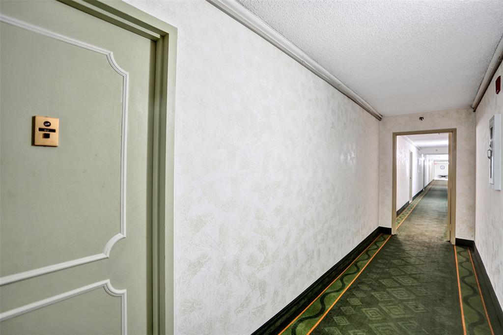 1100 St Charles Place, Unit 612 Pembroke Pines, FL 33026 - Photo 45 of 71 a view of hallway with wooden floor