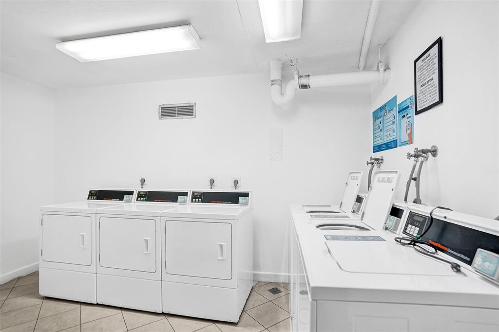 1100 St Charles Place, Unit 612 Pembroke Pines, FL 33026 - Photo 47 of 71 a utility room with dryer and washer