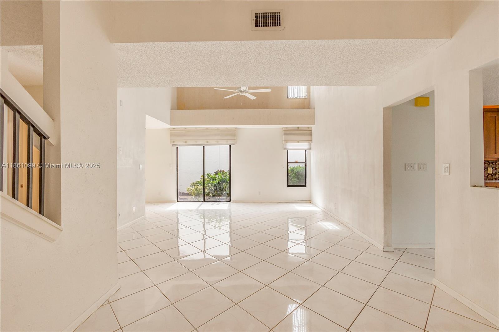 5535 Eton Court Boca Raton, FL 33486 - Photo 12 of 61 a view of an empty room with window