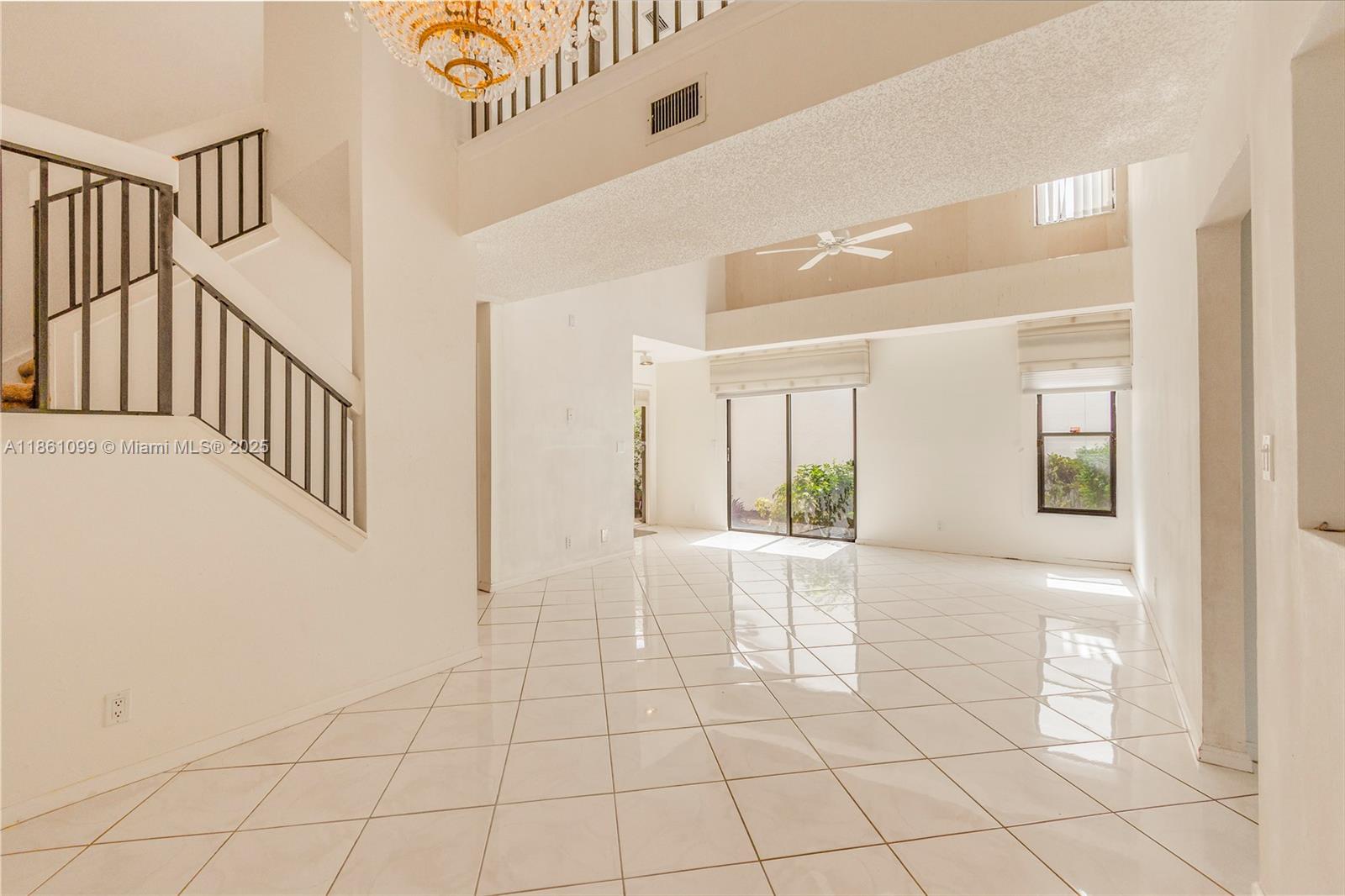 5535 Eton Court Boca Raton, FL 33486 - Photo 13 of 61 a view of an entryway with wooden floor