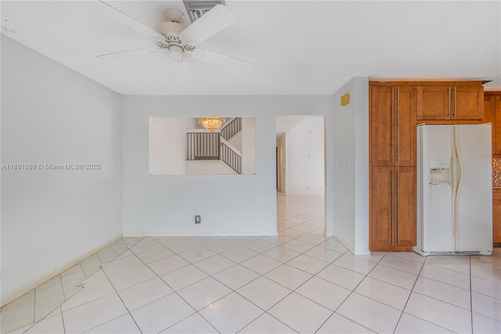 5535 Eton Court Boca Raton, FL 33486 - Photo 19 of 61 an empty room with closet and fan
