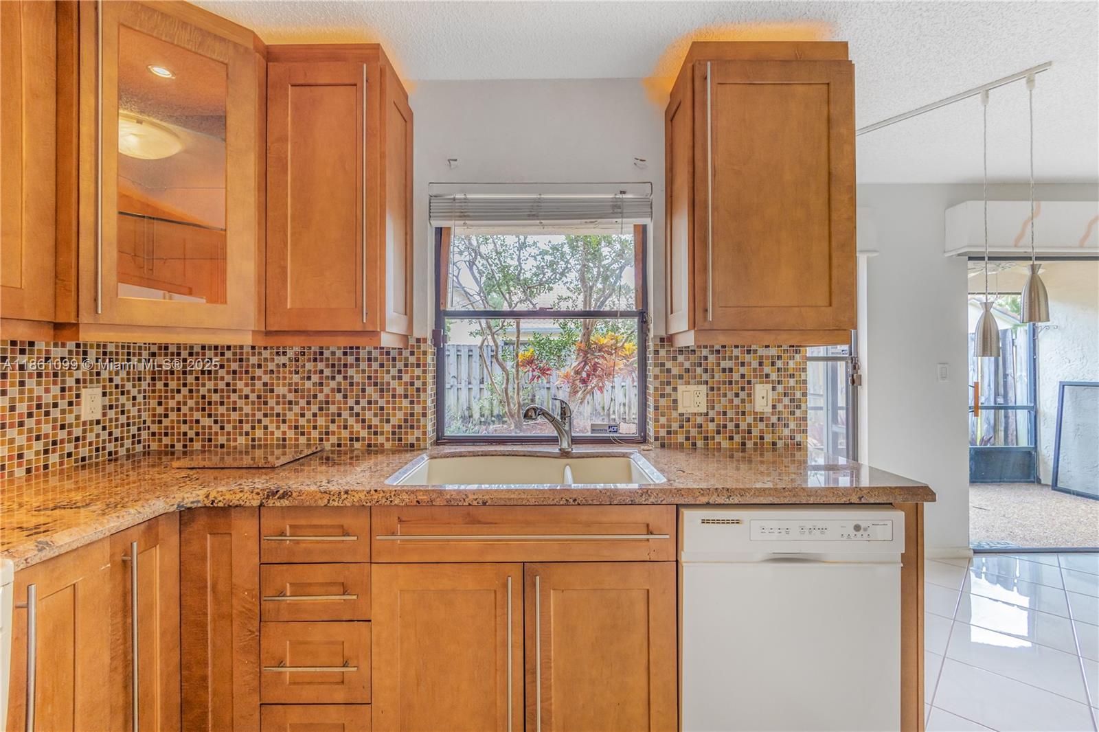 5535 Eton Court Boca Raton, FL 33486 - Photo 23 of 61 a bathroom with a sink and a mirror