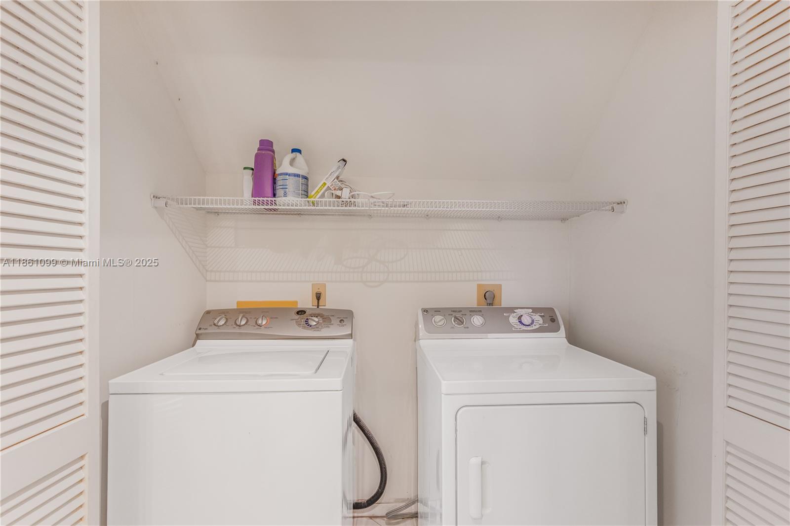 5535 Eton Court Boca Raton, FL 33486 - Photo 24 of 61 a utility room with dryer and washer