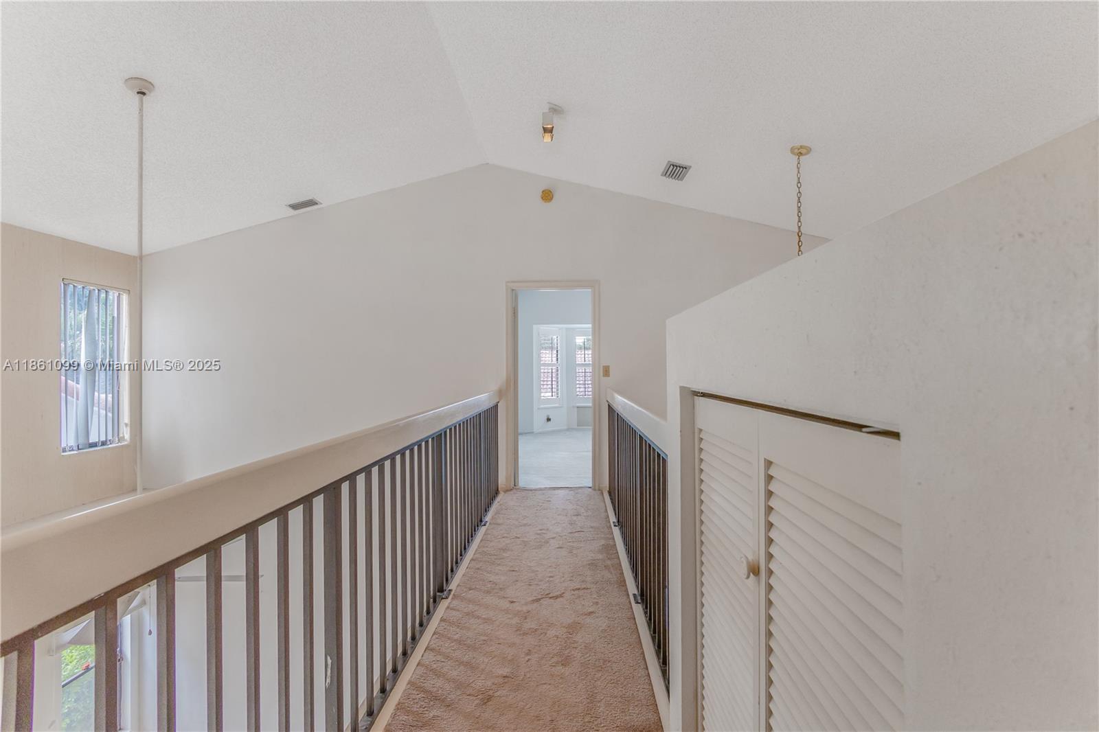 5535 Eton Court Boca Raton, FL 33486 - Photo 26 of 61 a view of a hallway with closet
