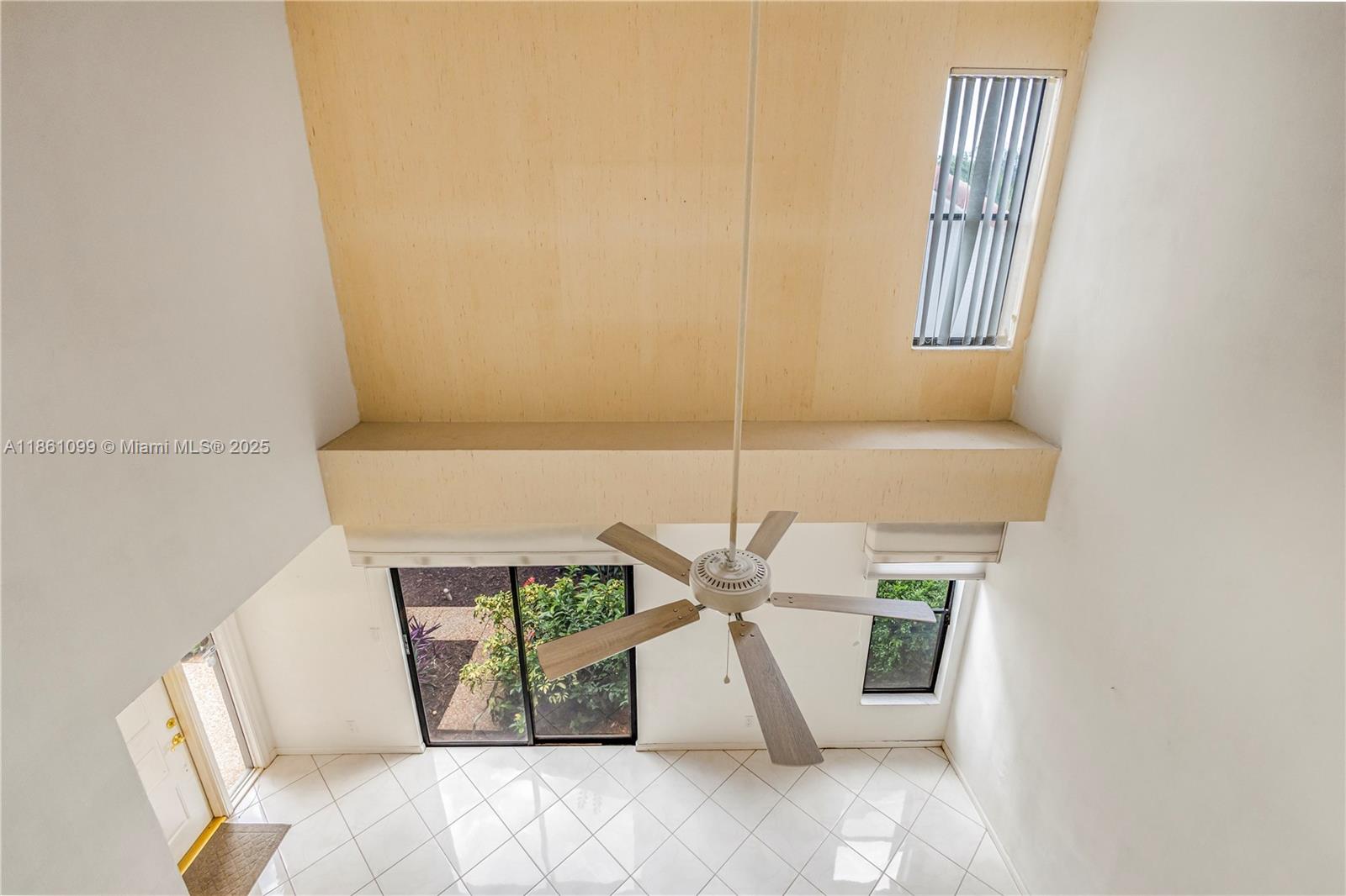 5535 Eton Court Boca Raton, FL 33486 - Photo 27 of 61 a view of an empty room with a window