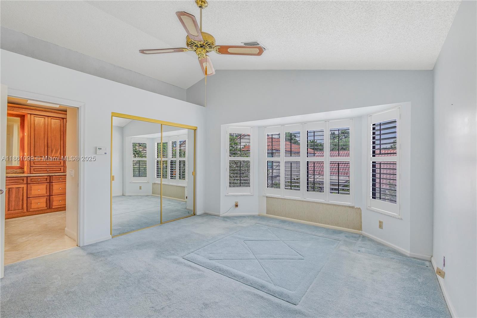 5535 Eton Court Boca Raton, FL 33486 - Photo 31 of 61 a view of empty room with windows