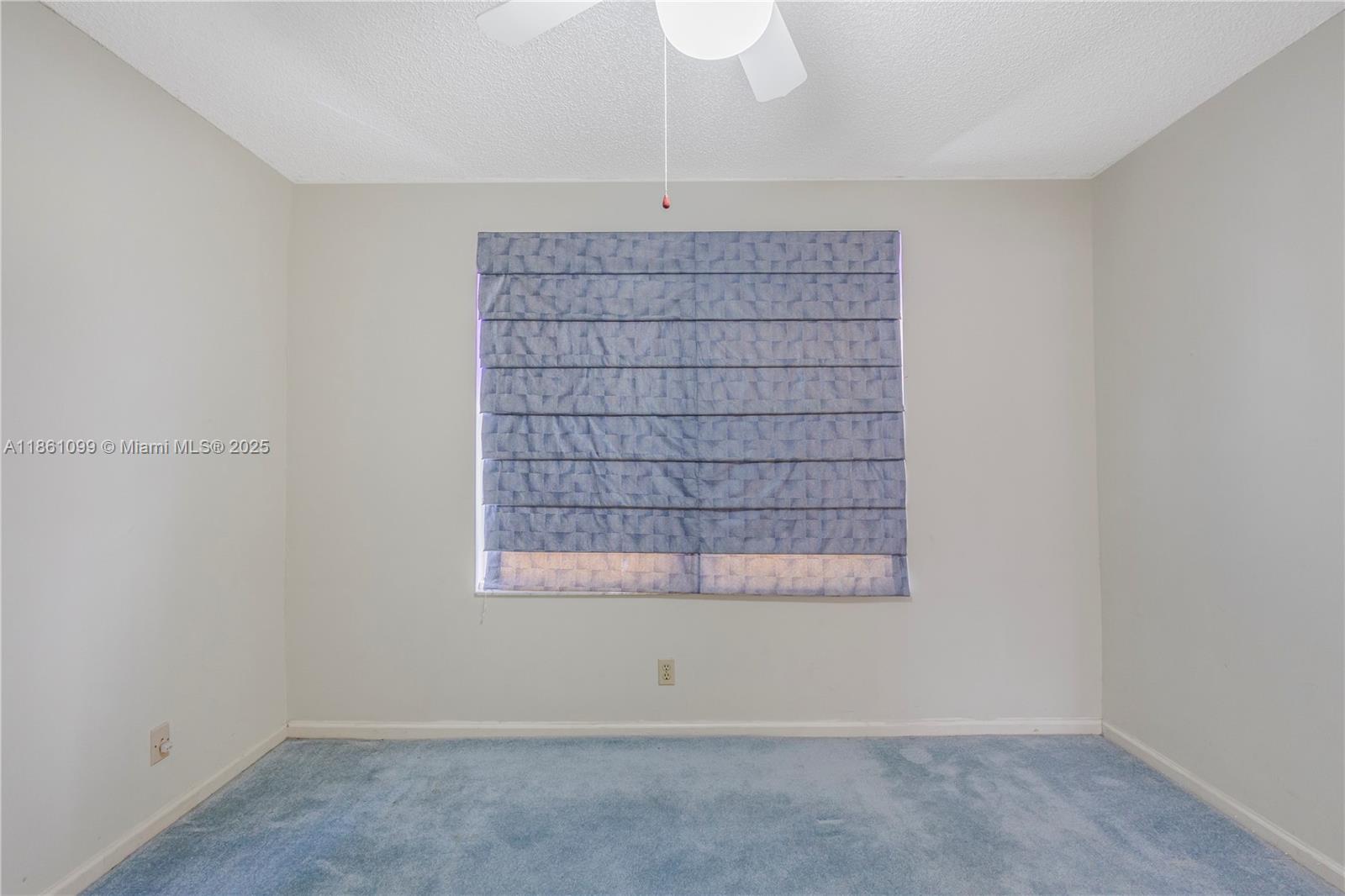 5535 Eton Court Boca Raton, FL 33486 - Photo 42 of 61 an empty room with a empty space and windows
