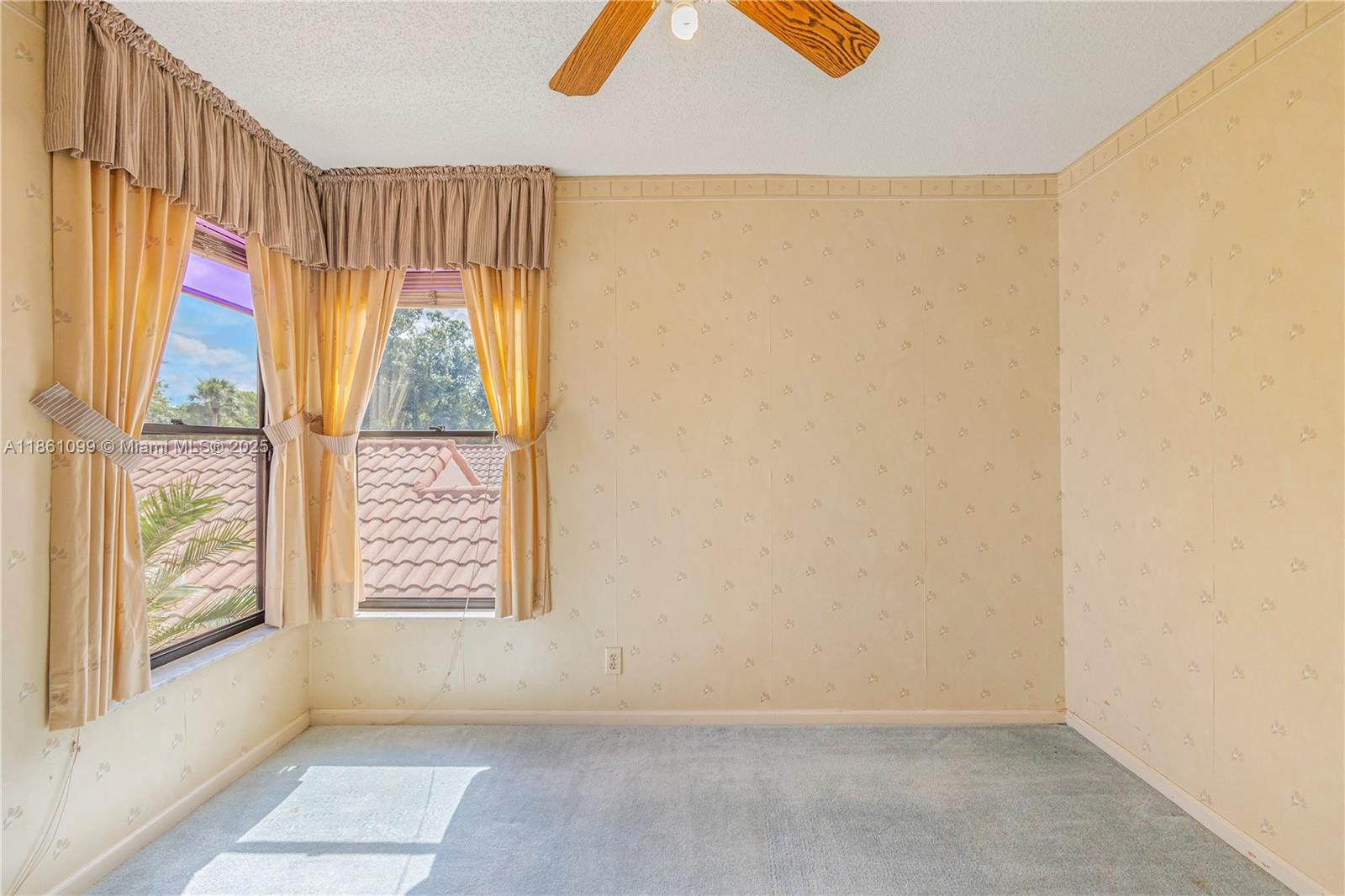 5535 Eton Court Boca Raton, FL 33486 - Photo 44 of 61 an empty room with windows