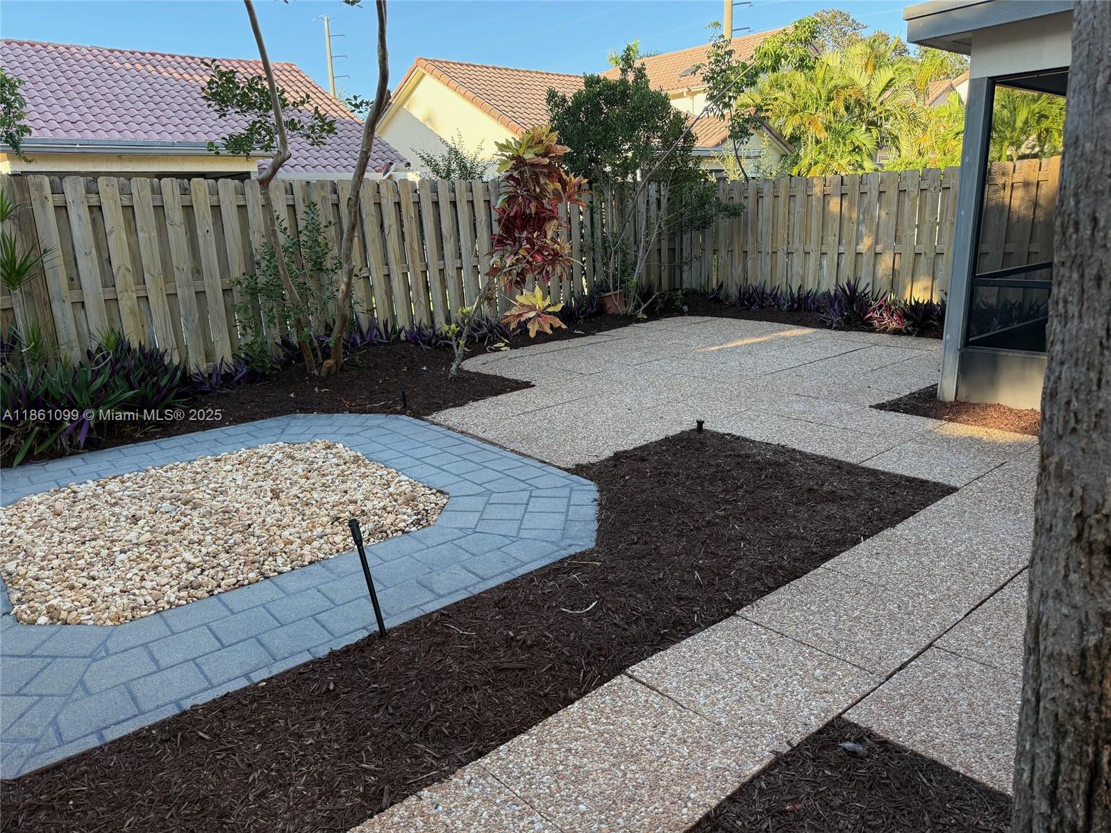 5535 Eton Court Boca Raton, FL 33486 - Photo 58 of 61 a view of a backyard